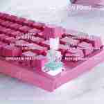Close-up feature graphic of a pink magnetic switch on the Attack Shark X68 HE keyboard detailing adjustable actuation points from 0.1mm to 4.0mm and operation force. Headline reads "ADJUSTABLE ACTUATION POINT."