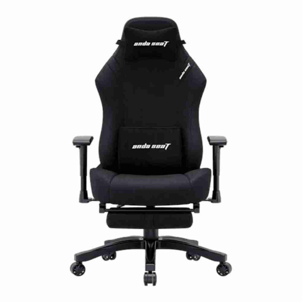Direct front studio shot of the all-black Anda Seat gaming chair fitted with neck pillow, lumbar cushion, and retracted footrest.