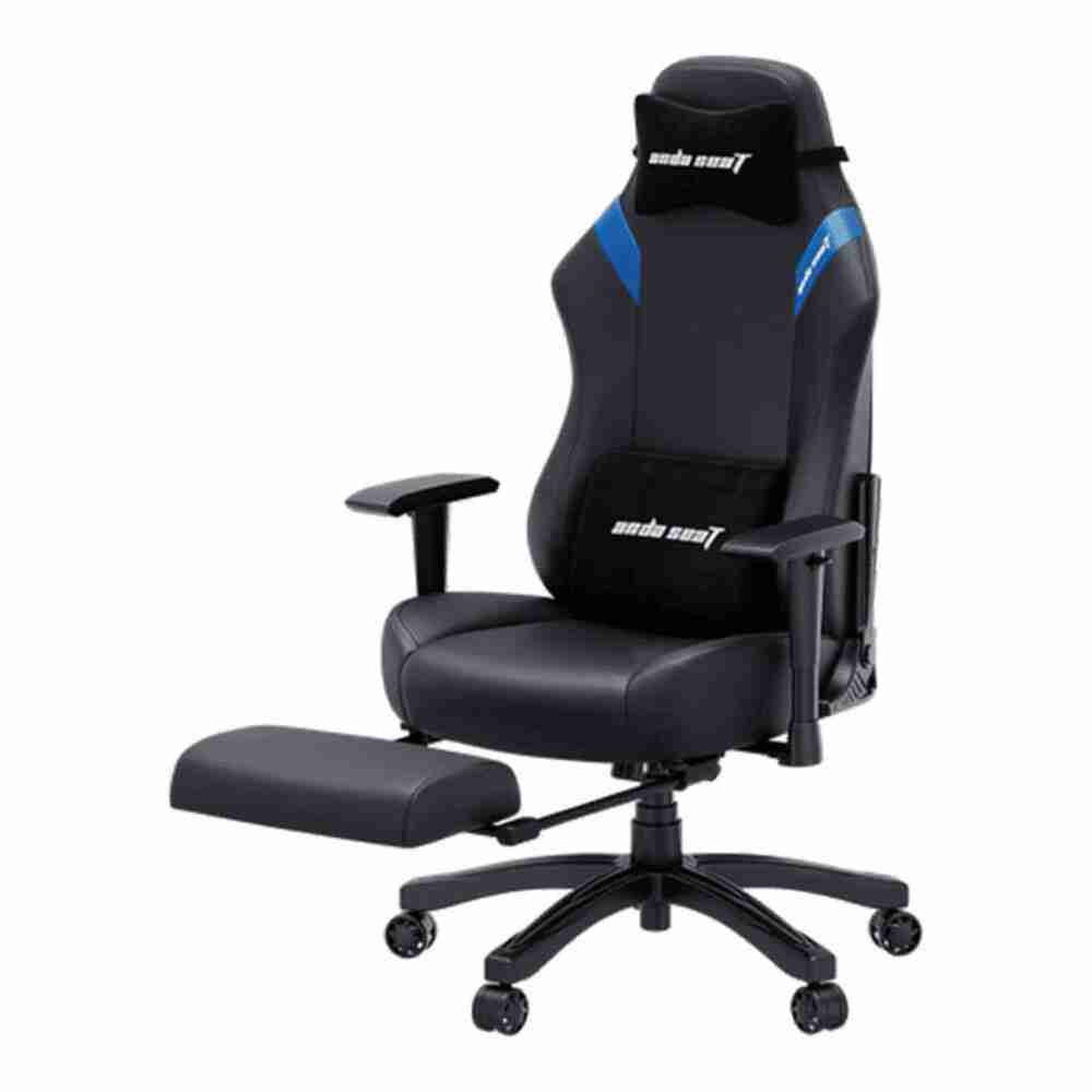 Angled studio shot of a black and blue Anda Seat ergonomic gaming chair featuring an extended pull-out footrest, lumbar support cushion, and neck pillow.